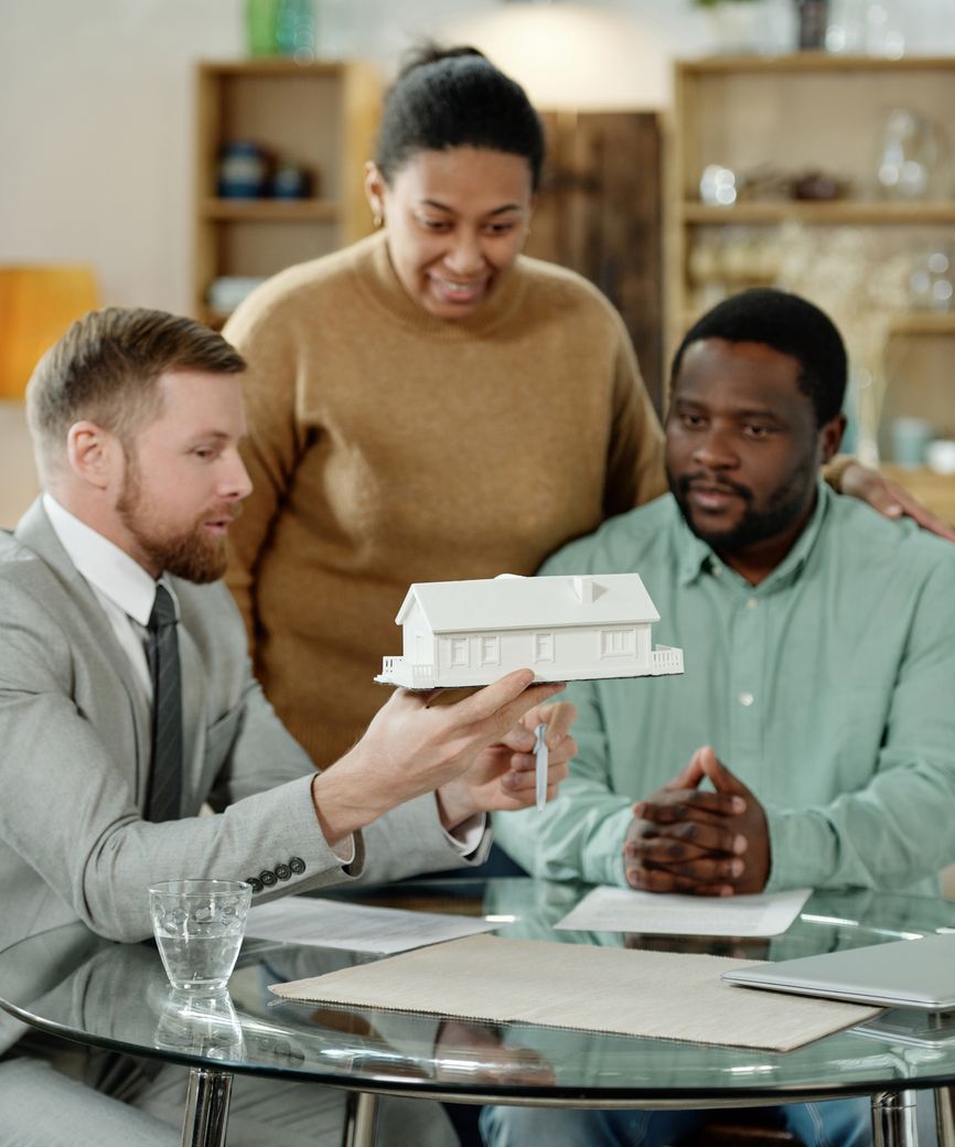 Colleagues reviewing a model together at a table